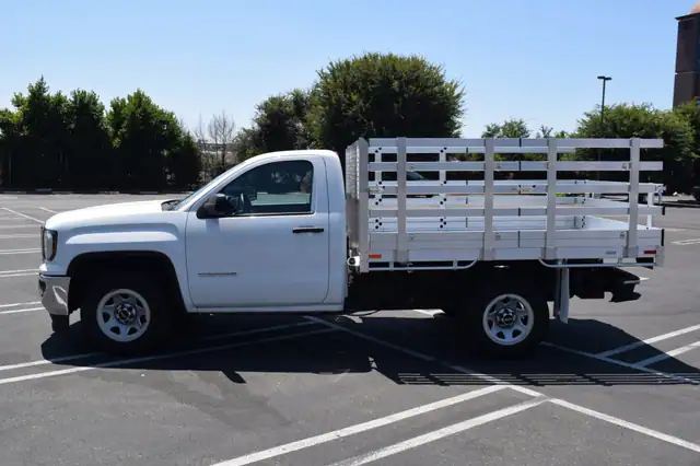 2018 GMC 1500, with a 6'6''X9' aluminum body, 38'' lift out side gates, 22'' fold down rear gates & D-Rings
