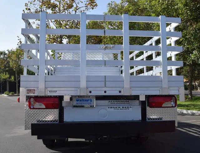 2016 Mercedes-Benz Sprinter 3500 Dual Rear Wheel with a 7' X 14' Alumbody aluminum stake bed with 38" lift out stakes, 4 underbody tool boxes 18" X 18" X 60" 18" X 18" X 36" and dock bumper