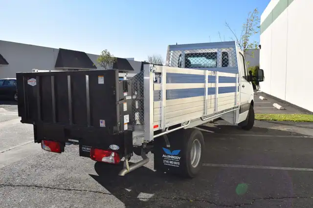 2014 Mercedes-Benz Sprinter 3500 Dual Rear Wheel with a 7' × 13'6" Alumbody aluminum flat bed with 25" fold-down gates and Tommygate lift gate