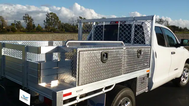 2014 Toyota Tundra with a 6'6" × 7' Alumbody aluminum flat bed, 2 topsider tool boxes, 2 custom underbody tool boxes, vise mount area and removable PVC pipe rack