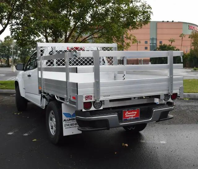2019 Chevy Colorado 6 X 66 Aluminum Stake Bed with 22 Fold Down Gates using the Factory Bumper.