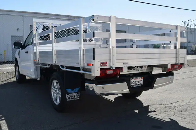 2021 F150 with a 66" × 9' Alumbody aluminum bed, 22" fold-down gates using the factory taillights and factory bumper