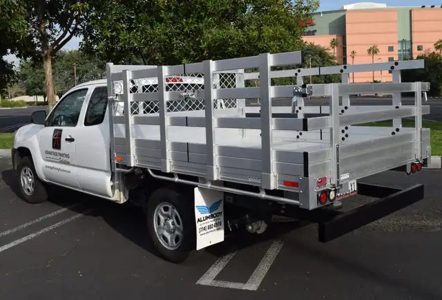 2021 Toyota Tundra, 6'6" x 9' aluminum stake bed with 38" lift-out stakes, dock bumper, and hitch
