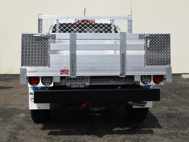 2017 Chevy Colorado with a 6' X 6'6" Alumbody aluminum flat bed 2 topsider tool boxes fold down rear gate and dock bumper