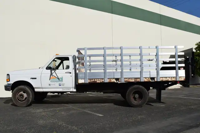 Aluminum Gate Assembly for a 2000 F350 8'x12', with 42'' lift out, side stakes and Tommy Gate in the rear