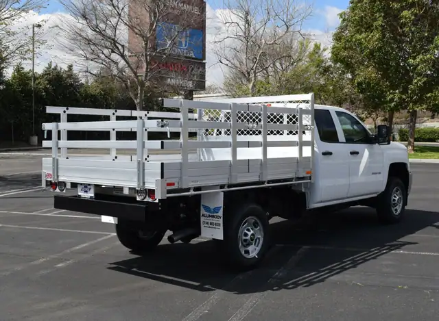 2019 Chevy 2500 66 X 9 Aluminum Stake Bed with 30 Lift Out Sides 22 Fold Down sides a dock Bumper.