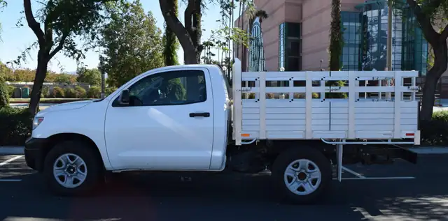 2013 Toyota Tundra with Alumbody aluminum stake bed and 31" custom lift-out stakes